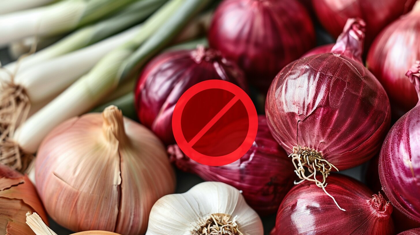 Fresh onions and garlic placed with a warning sign indicating their toxicity to chickens.